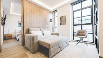 Standard Apartment, Balcony | Living area | 32-inch LED TV with digital channels, Netflix, streaming services