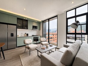 Executive Apartment, Balcony | Living area | 32-inch LED TV with digital channels -  Casa Indigo Apartahotel Parque 93 (Bogotá)