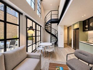Premium Duplex, Terrace | Living area | 32-inch LED TV with digital channels -  Casa Indigo Apartahotel Parque 93 (Bogotá)