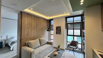 Standard Apartment, Balcony | Living area | 32-inch LED TV with digital channels, Netflix, streaming services