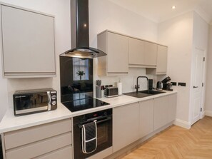 Cottage | Private kitchen | Dishwasher, cookware/dishes/utensils - The Salisbury Apartment 303 (Scarborough)