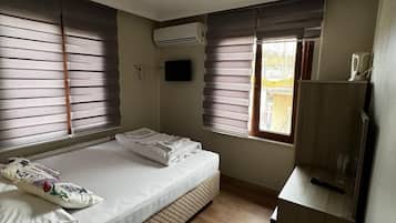 Suite económica, vista a la ciudad | 1 habitación, wifi gratis y ropa de cama