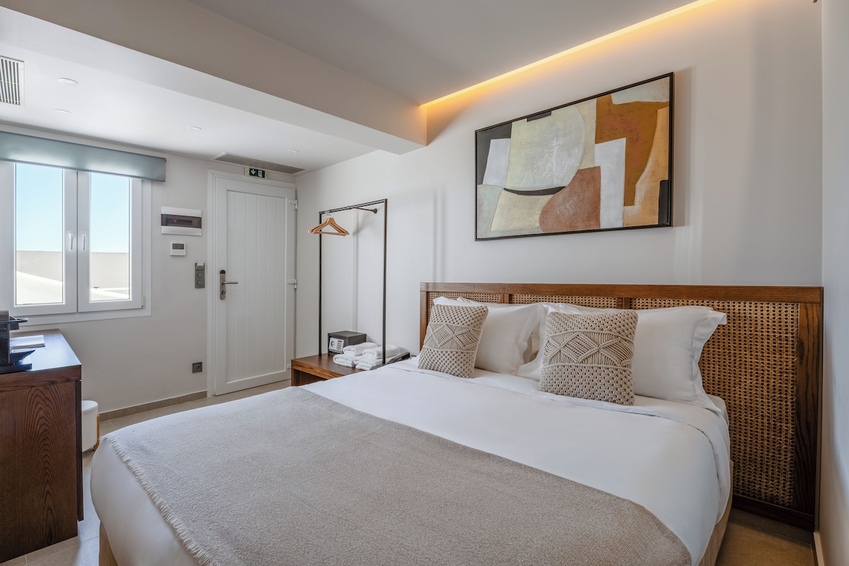 Habitación Prestigio | Ropa de cama hipoalergénica y minibar