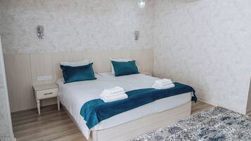 Deluxe Double or Twin Room, Courtyard View | Desk, laptop workspace, soundproofing, iron/ironing board