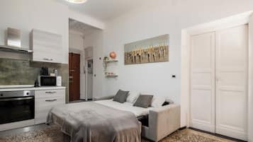 1 bedroom, desk, iron/ironing board, travel cot