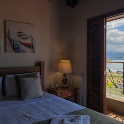 Luxury Double Room, Lanai, Beach View | 1 bedroom, minibar, desk, laptop workspace