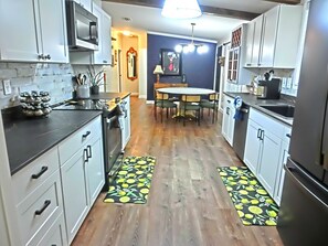 Fridge, microwave, oven, stovetop - Family-Friendly Riverfront Home w/ Game Room, Kayaks, Swim Mat & Space to Play (Weeki Wachee)