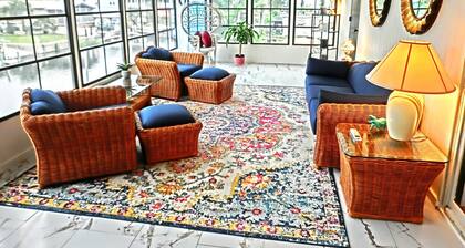 Family-Friendly Riverfront Home w/ Game Room, Kayaks, Swim Mat & Space to Play