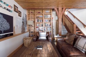 Smart TV, fireplace, books