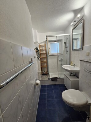 Hair dryer, towels, soap, toilet paper