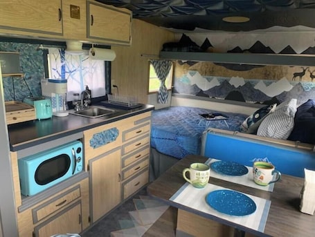1 bedroom, WiFi, bed sheets. Glacier, chill out in this cool camper!
