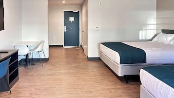 Seprai premium, setrika/meja setrika, Wi-Fi gratis, dan seprai linen