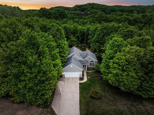 4bdr 2 bath house. Unwind in the hot tub, chat around the fire pit and disc golf