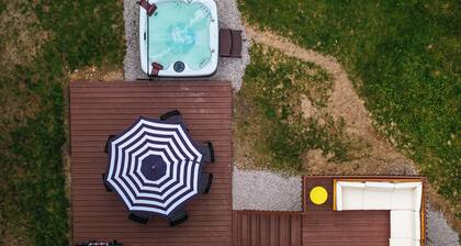 4bdr 2 bath house. Unwind in the hot tub, chat around the fire pit and disc golf