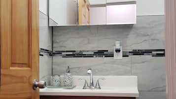 Jetted tub, hair dryer, towels, soap