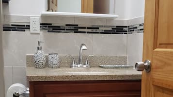 Jetted tub, hair dryer, towels, soap