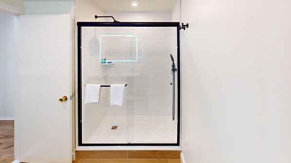 Shower, hair dryer, towels