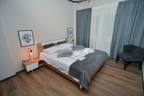 1 bedroom, desk, iron/ironing board, travel cot