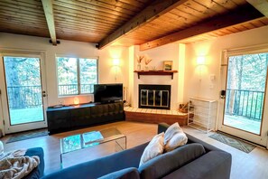 Smart TV, fireplace, DVD player, books