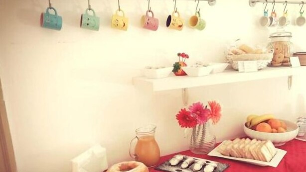 A breakfast buffet with various food items and a coffee station. - B&B LA TUA DIMORA (Palermo)