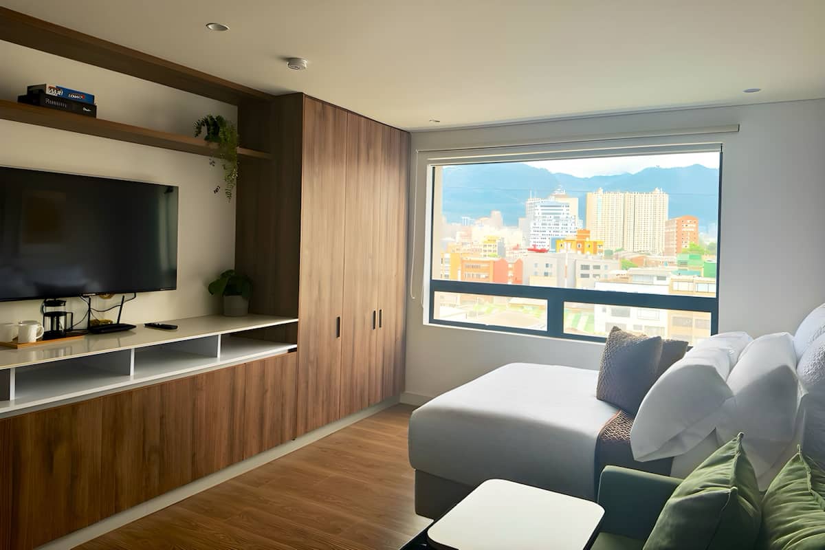 1 bedroom, desk, laptop workspace, iron/ironing board