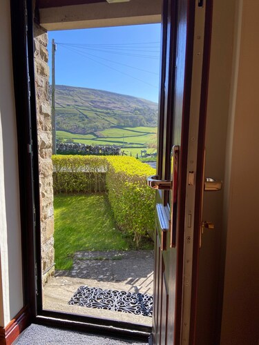 A cosy stone cottage with stunning views, village charm, and adventure at your doorstep