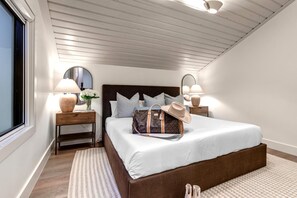 A bedroom with a large bed, two bedside tables, a mirror, and a window. - KBM Resorts Hidden Creek Bright and Airy, Near Canyons Cabriolet, Gas Fireplace, Private Hot Tub, Comm Summer Pool Hct-26c (Park City)