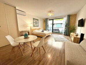1 bedroom, desk, iron/ironing board, travel crib