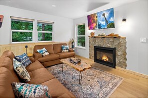 Smart TV, fireplace, foosball, books