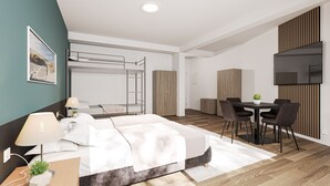 Una habitación de hotel moderna con una litera, un escritorio y un comedor.