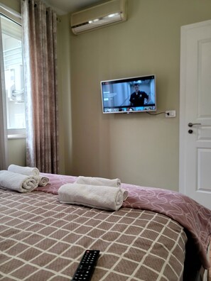 1 chambre, fer et planche à repasser, Wi-Fi, draps fournis