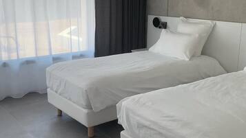 2 dormitorios, tabla de planchar con plancha, wifi gratis y ropa de cama