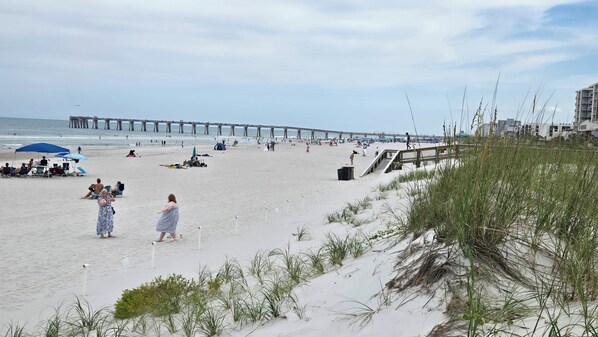 On the beach, sun-loungers, beach towels