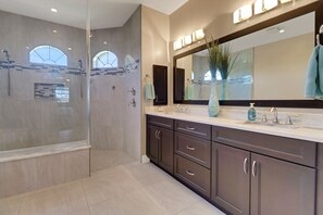 Shower, hair dryer, towels