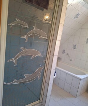 Shower, hair dryer, towels