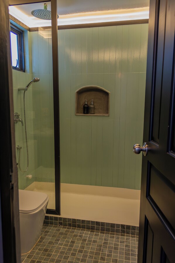 A bathroom with a shower, toilet, and bathtub. - Zinnia Villa (Maafushi)