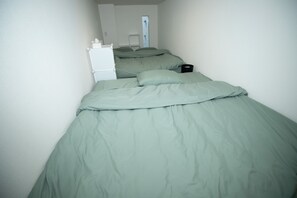 2 bedrooms, desk, iron/ironing board, travel cot