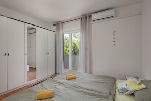 2 quartos, Wi-Fi de cortesia, roupa de cama