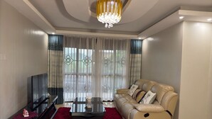 Family Double or Twin Room | Living area - Harmony Heights (Kampala)