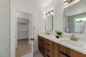 Hair dryer, towels, soap, shampoo
