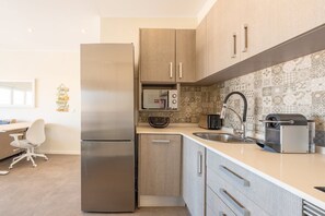 Microonde, forno, lavastoviglie, macchina per tè/caffè