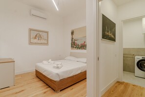 Desk, iron/ironing board, internet, bed sheets