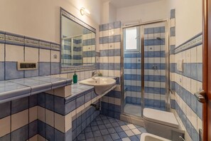 Shower, hair dryer, bidet, towels - GuestHost - Bright apartment of about 100 sqm, perfect for 3 people, located on the seventh floor of a building with elevator (NOT suitable for disabled people - some steps to access it).The property is located in a quiet residential area well connected  (Rome)