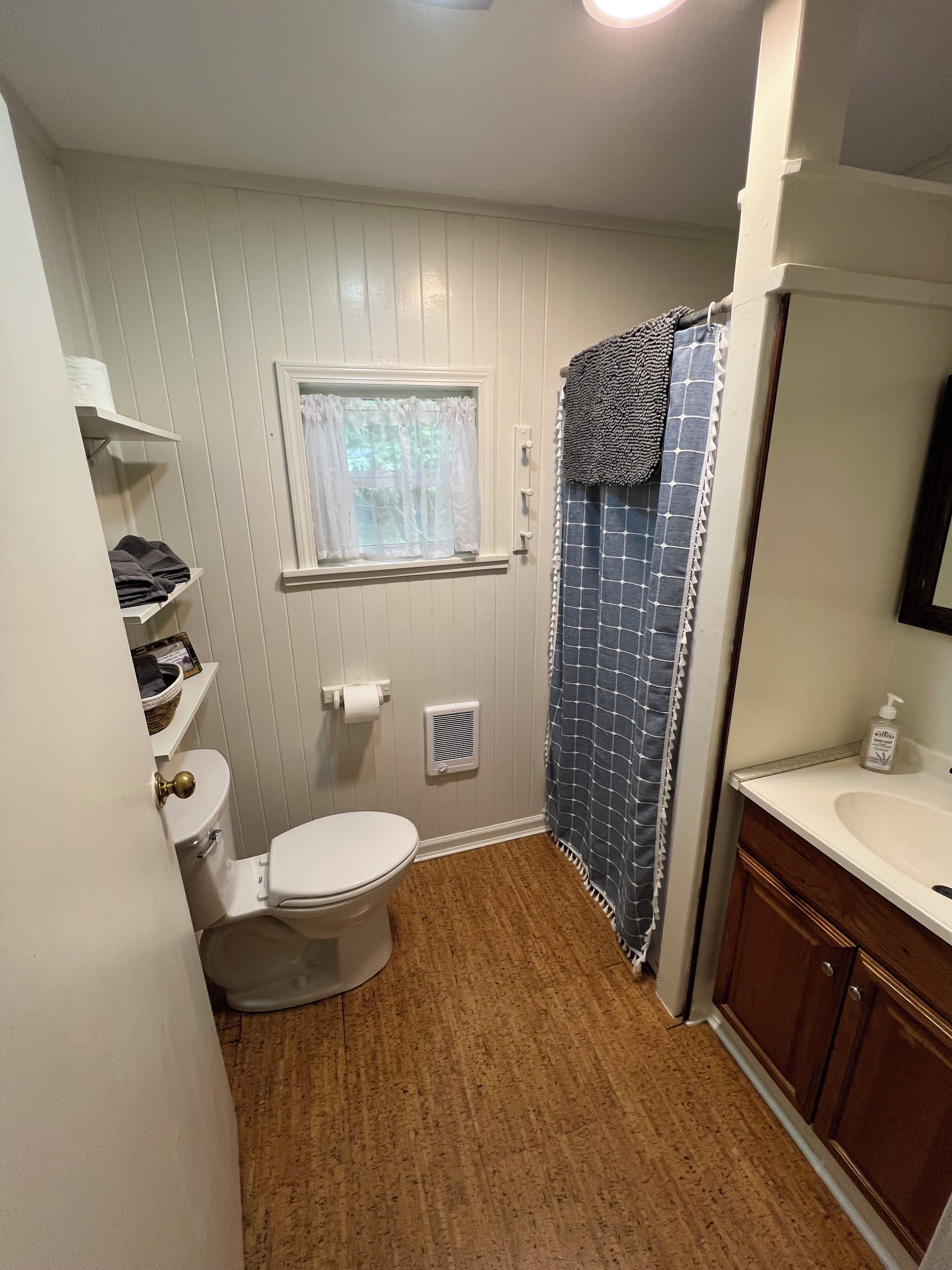 Shower, towels, soap, toilet paper
