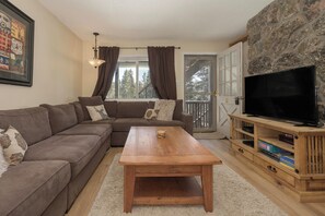 TV, fireplace - Gorgeous end unit, over the Fraser River in downtown Winter Park (Winter Park)