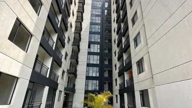 A multi-story residential building with a central courtyard. - New Dawn Home (Nairobi)