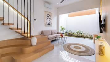 Villa Deluxe, vista piscina | Area soggiorno