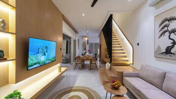 Villa Deluxe, vista piscina | Area soggiorno