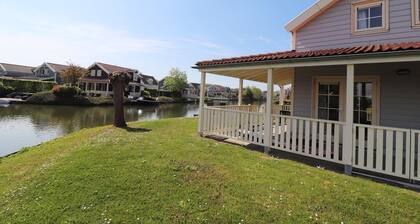Bungalow by Water near Rotterdam with Sauna