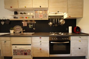Réfrigérateur, four, plaque de cuisson, lave-vaisselle